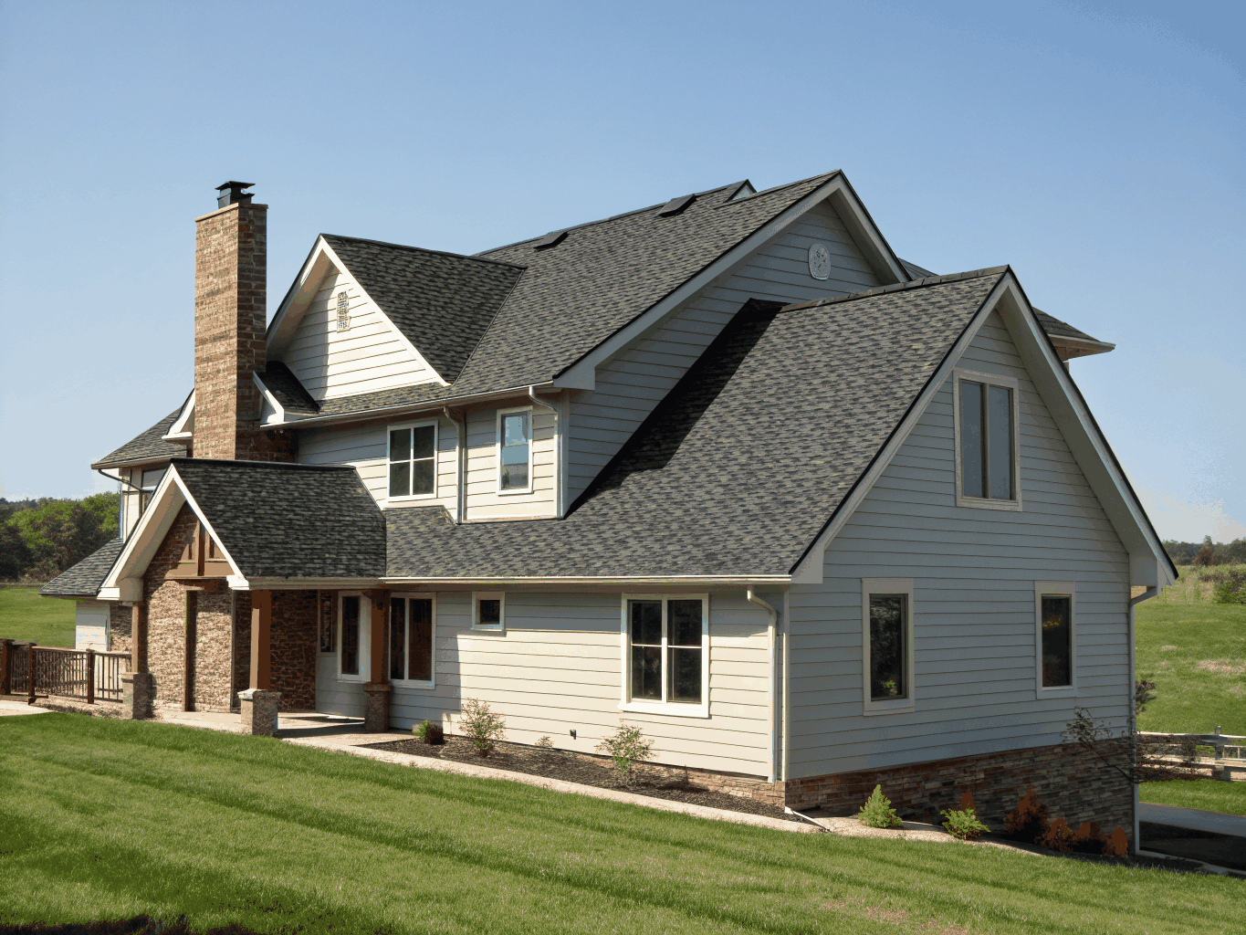 Single family residential home undergoing exterior rehab and roofing renovation